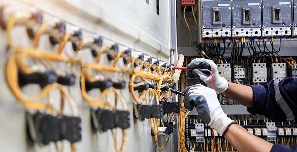 Professional Electrician technician working in Massapequa Park, NY
